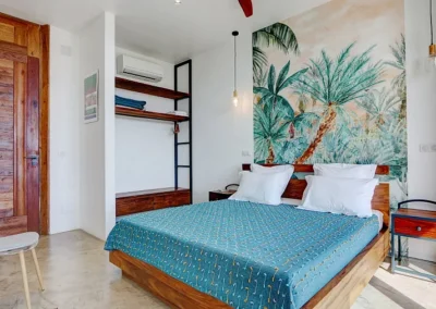Une chambre aménagée villa nosy be